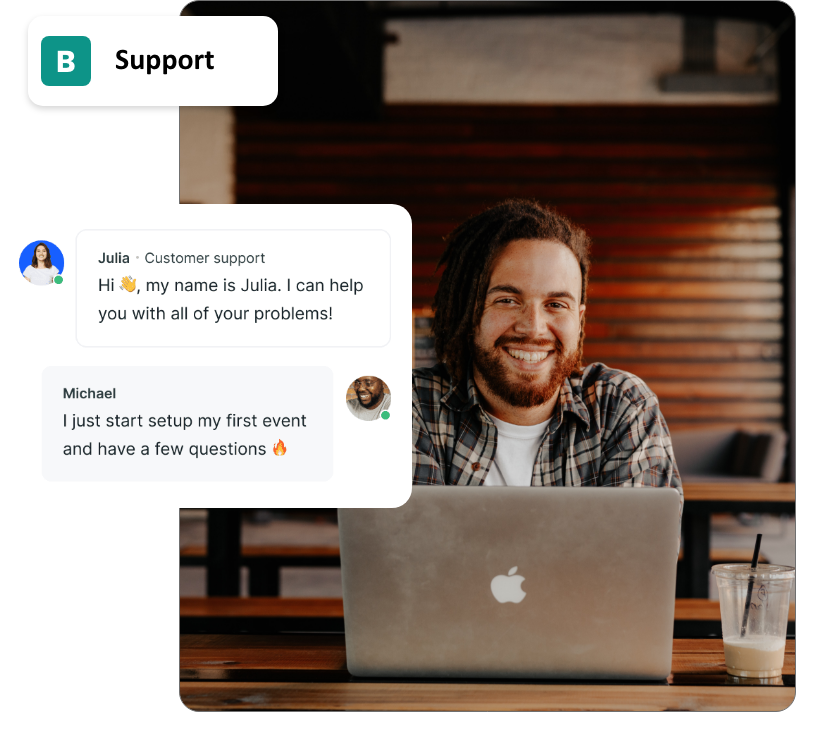 Whitney leaning against a railing on a downtown street